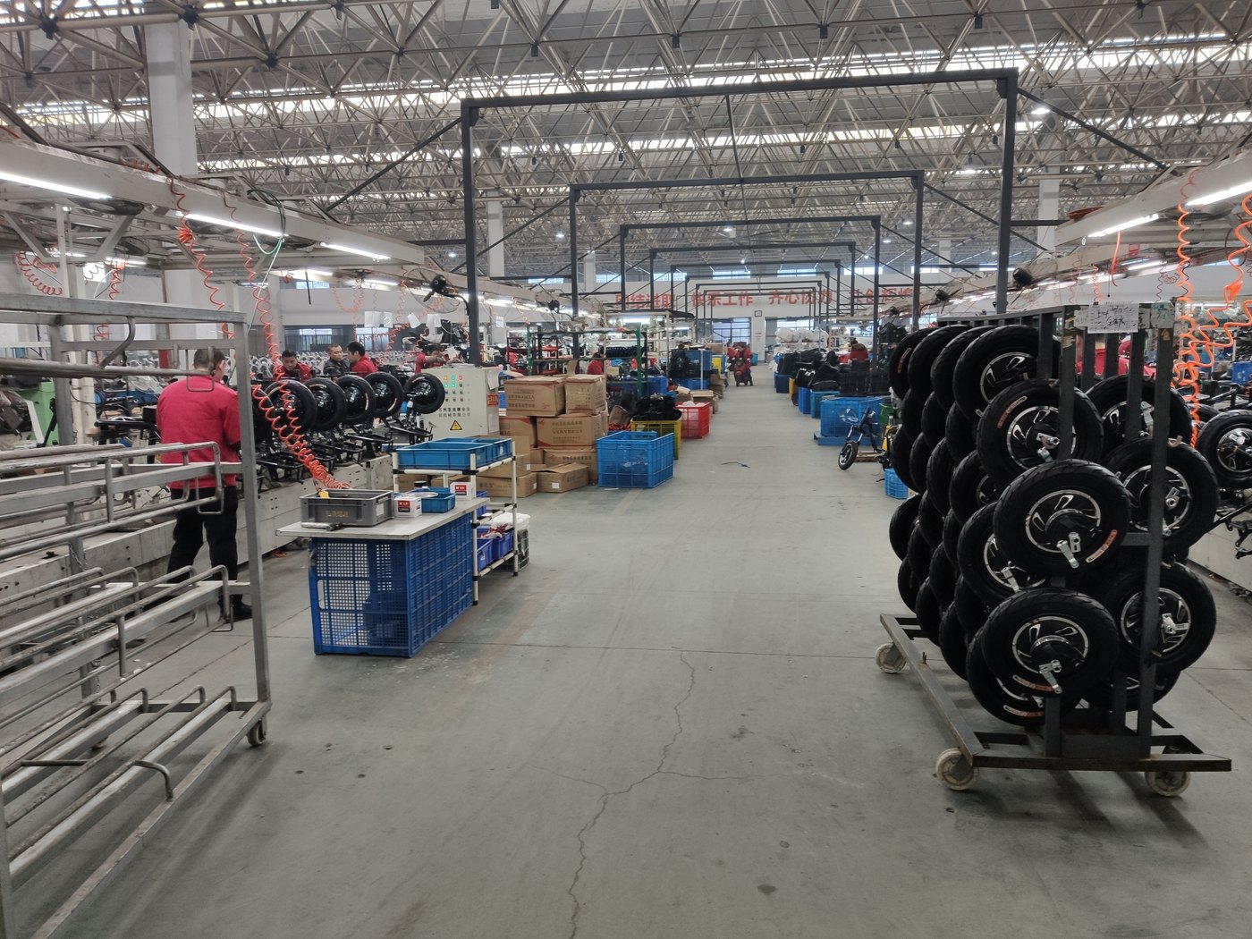 DODO Electric quality control station inspecting electric vehicle components